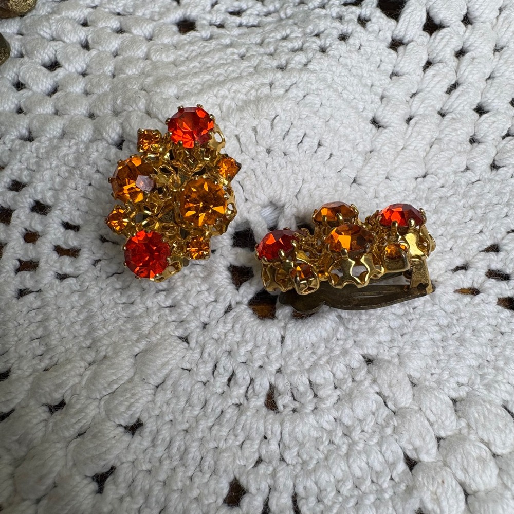 Vintage Austria Orange Rhinestone GLOWS Gold Tone Clip On Earrings MCM